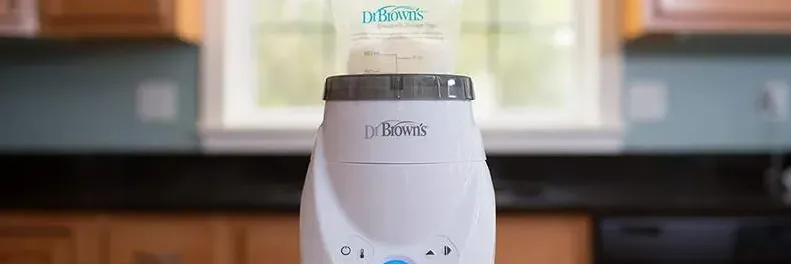 Dr Browns MilkSPA Breast Milk & Bottle Warmer AC143 User Guide
