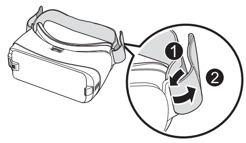 bar of the Gear VR (3), then pull it upward until it locks in place (4). The hook snaps when secured.