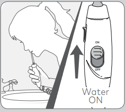 using_the_water_flosser_waterpik_white_aquarius_water_flosser_wp-660.png